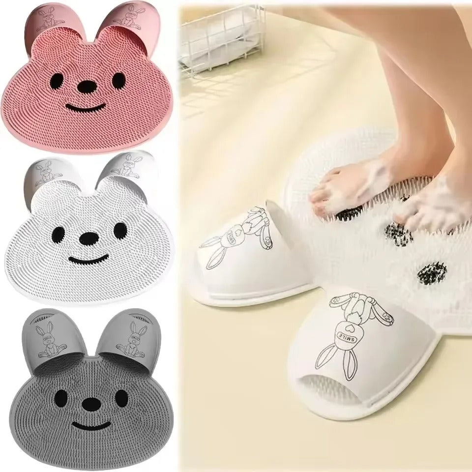Three color options of the Footsly shower mat: White, Pink, and Gray shown side by side
