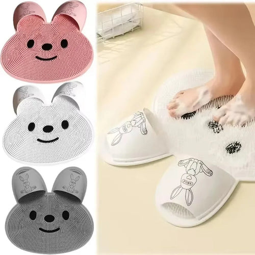 Three color options of the Footsly shower mat: White, Pink, and Gray shown side by side